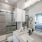 well lit bathroom with walk-in shower