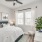 large windows brighten bedroom