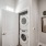 stacked washer/dryer in laundry closet